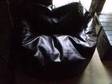 Black faux leather bean chair x 2. Black faux leather....